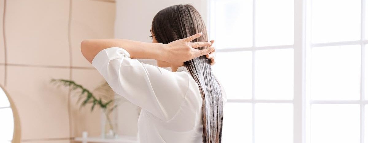 el mejor aceite para el pelo dañado